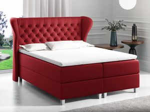 Miniaturka 4 - Czerwone łóżko kontynentalne z pikowanym zagłówkiem uszakiem w sypialni