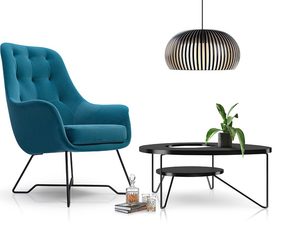 Miniaturka 2 - Fotel turkusowy z pikowanym oparciem i metalowymi nogami w aranżacji