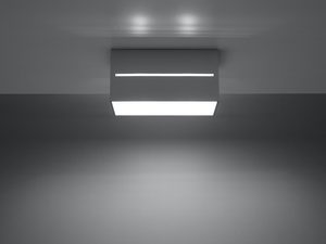 Miniaturka 14 - Sufit betonowy z czarną lampą LED nad strefą wypoczynku