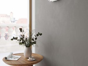 Miniaturka 4 - Kinkiet w białym kolorze zamontowany na szarej ścianie