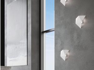 Miniaturka 10 - Białe geometryczne kinkiety LED w nowoczesnym salonie z przeszkleniem