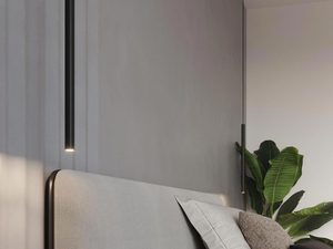 Miniaturka 3 - Cienki czarny kinkiet LED w pionowym układzie przy łóżku