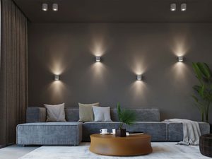 Miniaturka 4 - Salon z ciemnymi ścianami i symetrycznie rozmieszczonymi kinkietami