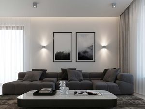 Miniaturka 4 - Wnętrze salonu z trzema kinkietami ściennymi i szarą sofą