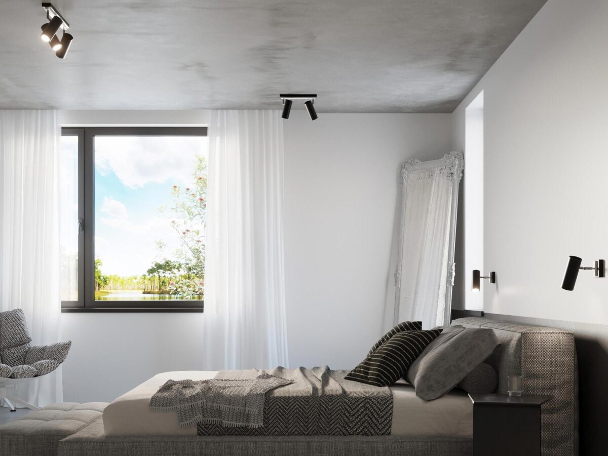 Industrialna sypialnia z fotelem