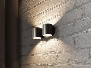 Miniaturka 9 - Aranżacja salonu z nowoczesnym czarnym kinkietem na ścianie z cegły