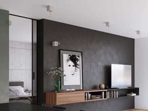 Miniaturka 4 - Pokój dzienny z sufitowymi punktami świetlnymi i ciemną ścianą akcentującą