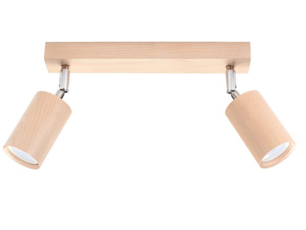 Zbliżenie na drewnianą listwę z cylindrycznymi reflektorami