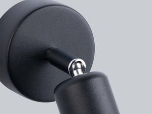 Miniaturka 3 - Zbliżenie na czarną oprawkę kinkietu – styl minimalistyczny