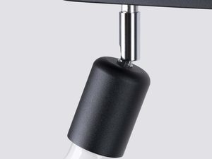 Miniaturka 3 - Zbliżenie na czarny reflektor z chromowanym detalem – nowoczesny design