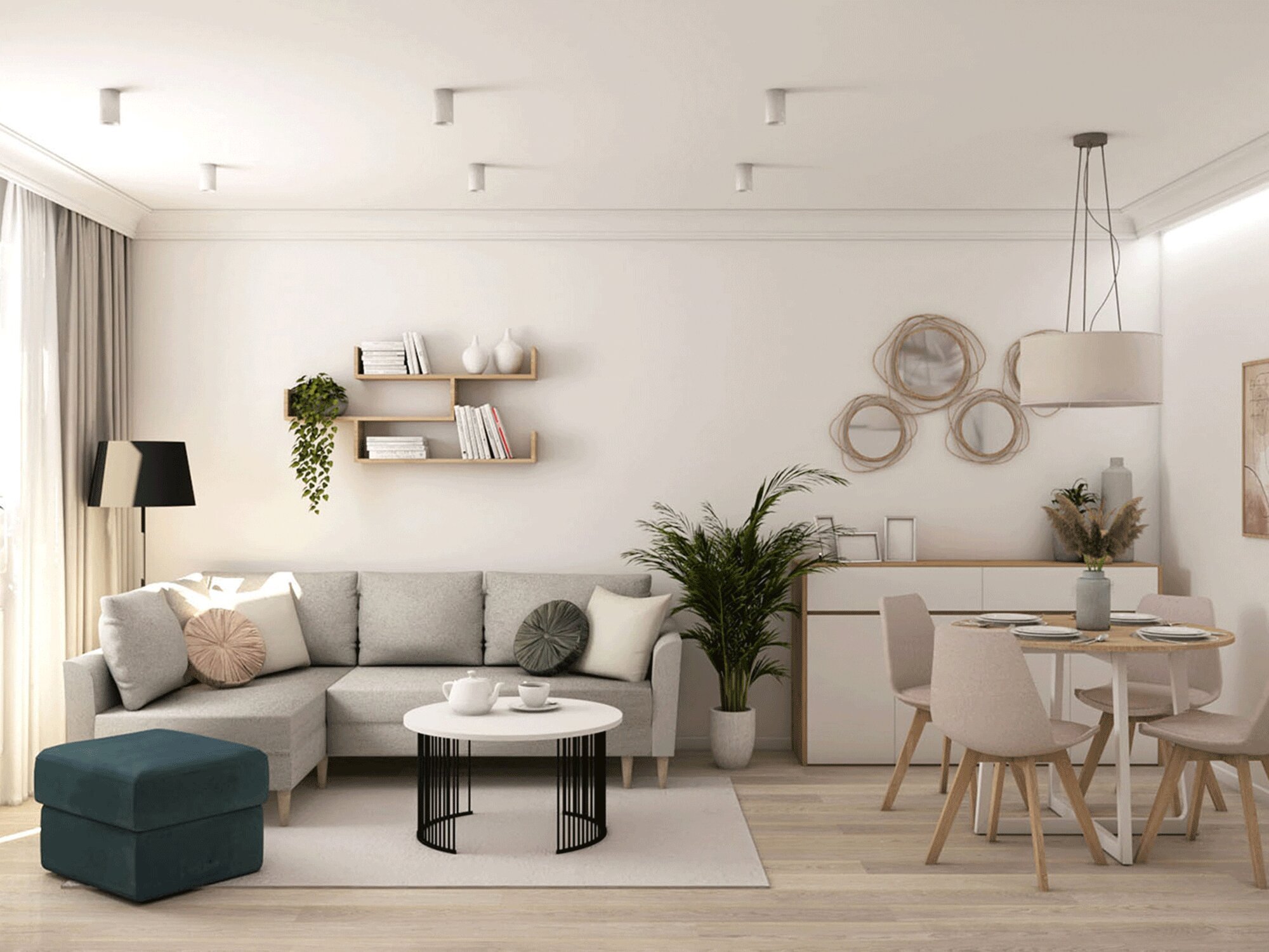 Białe meble i zielona sofa w jasnym salonie skandynawskim