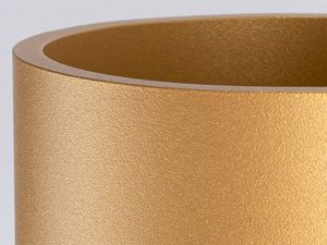 Miniaturka 3 - Zbliżenie na cylindryczną lampę LED w kolorze złotym