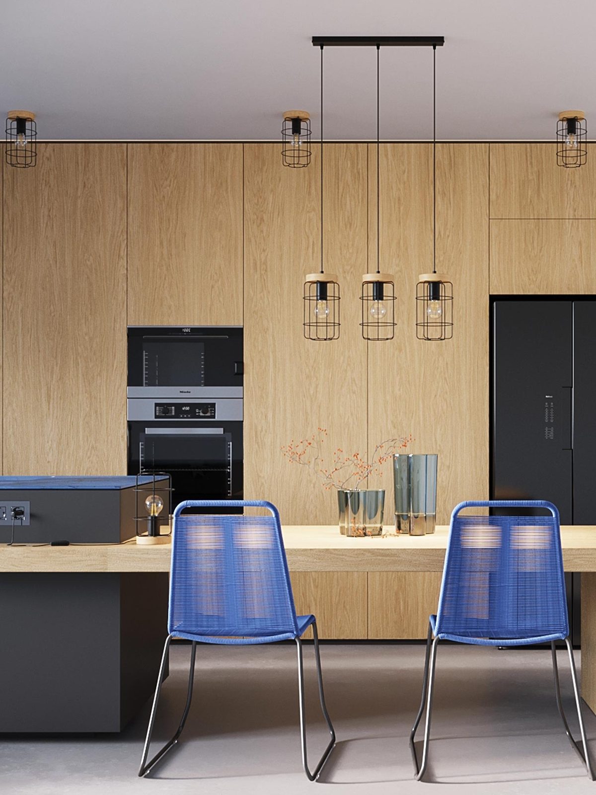 Wnętrze kuchni z wyspą i trzema lampami z metalową siatką