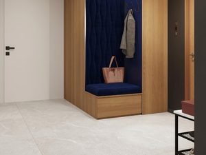 Miniaturka 20 - Nowoczesna aranżacja przedpokoju z drewnianymi szafkami i granatowym siedziskiem