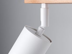 Miniaturka 3 - Zbliżenie na biały reflektor zamontowany na metalowej podstawie