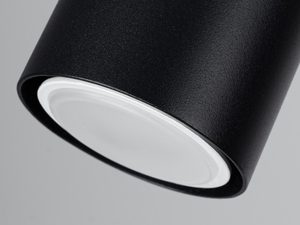 Miniaturka 4 - Zbliżenie na czarny reflektor sufitowy o cylindrycznym kształcie