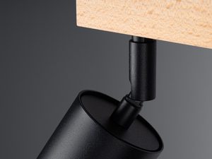 Miniaturka 1 - Zbliżenie na czarny reflektor LED z metalowym uchwytem