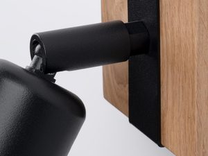 Miniaturka 3 - Zbliżenie na połączenie drewnianej bazy z czarnym reflektorem