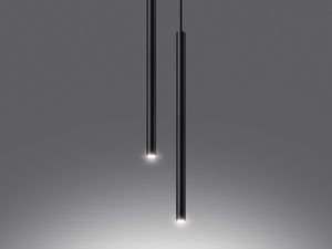 Miniaturka 10 - Dwie czarne tuby zwisające pionowo na tle ciemnej ściany