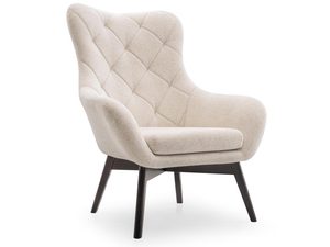 Miniaturka 1 - Beżowy fotel tapicerowany z dekoracyjnym pikowaniem w stylu nowoczesnym