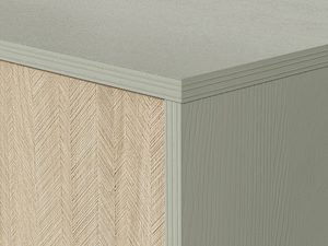 Miniaturka 18 - Zbliżenie na korpus komody z dekorem jodełkowym i oliwkowym wykończeniem