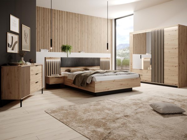 Aranżacja sypialni z drewnianymi meblami i nowoczesnym łóżkiem