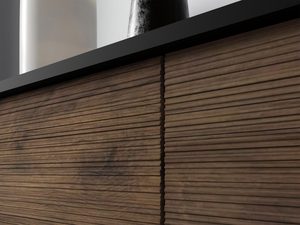 Miniaturka 5 - Detal drewnianej szafki RTV z ciemnymi frontami, poziome frezowanie