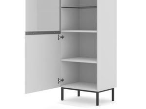 Miniaturka 4 - Wysoka, minimalistyczna witryna z białym frontem i czarnymi nóżkami