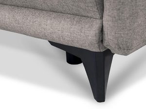 Miniaturka 13 - Detal czarnej nóżki sofy o nowoczesnym kształcie