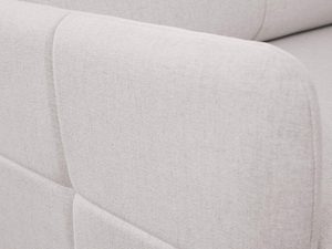 Miniaturka 4 - Detal jasnobeżowej sofy z prostymi liniami