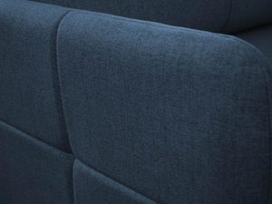 Miniaturka 30 - Detal ciemnogranatowej sofy z miękkim wykończeniem
