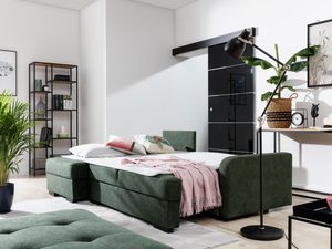 Miniaturka 9 - Rozłożony zielony narożnik z funkcją spania w nowoczesnym salonie