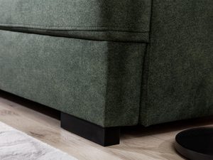 Miniaturka 5 - Detal nóg tapicerowanego narożnika w kolorze zielonym