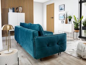 Miniaturka 6 - Nowoczesny narożnik w turkusowym kolorze z poduszkami i chromowanymi nóżkami