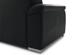 Miniaturka 2 - Zbliżenie na bok eleganckiego czarnego fotela tapicerowanego