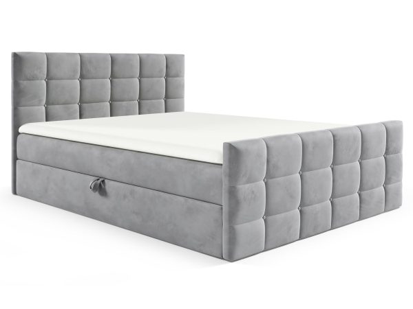 Łóżko tapicerowane w jasnoszarym kolorze z prostym, nowoczesnym designem