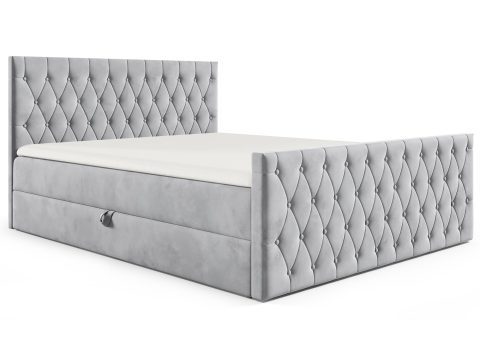 Łóżko tapicerowane w jasnoszarym kolorze z pikowanym zagłówkiem