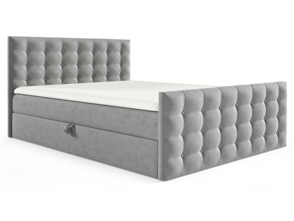 Łóżko tapicerowane w jasno szarym kolorze z pikowanym zagłówkiem
