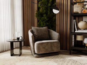 Miniaturka 29 - Beżowy fotel ustawiony przy półce i zielonej roślinie