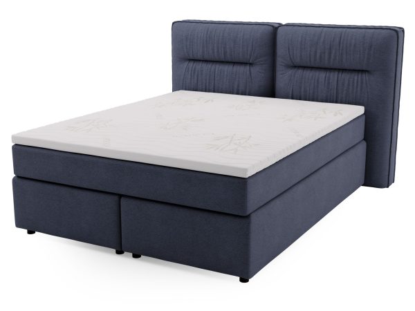 Granatowe łóżko tapicerowane z prostym przeszyciem i wyraźną strukturą tkaniny