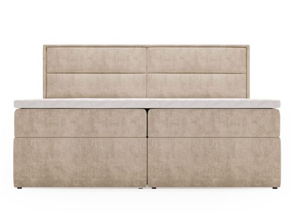 Beżowa sofa o minimalistycznym fasonie z pionowymi przeszyciami