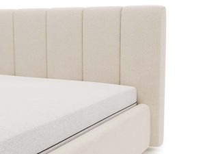 Miniaturka 30 - Detal kremowego zagłówka łóżka tapicerowanego pionowe pikowanie