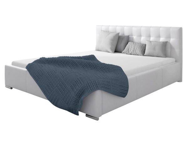 Białe łóżko kontynentalne z pikowanym zagłówkiem i schowkiem – klasyczne łóżko z eleganckim pikowaniem i funkcjonalnym pojemnikiem na pościel.