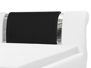 Miniaturka 2 - Zbliżenie na zagłówek łóżka tapicerowanego w kolorze białym z czarnym akcentem