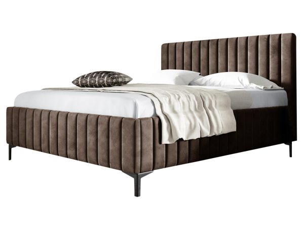 Beżowe łóżko sypialniane na smukłych nogach w nowoczesnym stylu