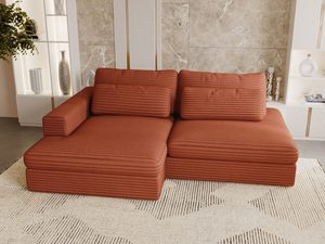 Miniaturka 49 - Rudawa sofa modułowa w przytulnej aranżacji z drewnianą podłogą