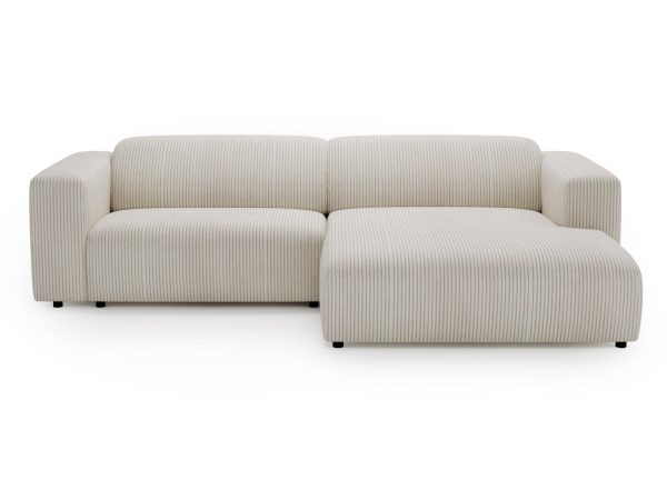 Beżowy narożnik z poduchami i delikatnym żłobieniem materiału