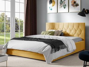 Miniaturka 3 - Żółte łóżko tapicerowane z pikowanym zagłówkiem w nowoczesnej sypialni