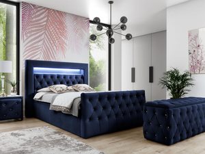 Miniaturka 5 - Granatowe łóżko z pikowanym zagłówkiem w sypialni