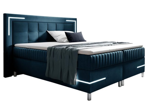 Nowoczesne łóżko tapicerowane w kolorze turkusowym z metalowymi nóżkami